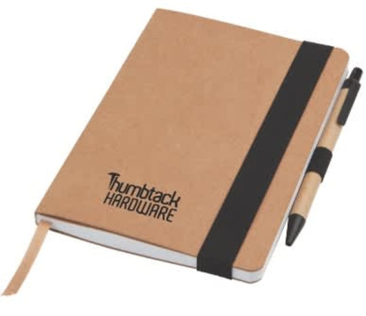 A brown notepad with a black elastic band, accompanied by a black and beige pen, featuring a logo on the cover.