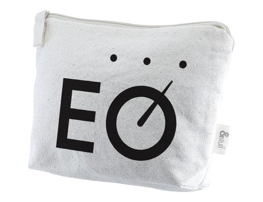 A white toiletry pouch featuring a simple black logo design. It has a zip closure and is made of durable fabric.