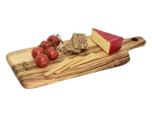 A large wooden serving board with a natural finish, featuring cherry tomatoes, cheese, and crackers.