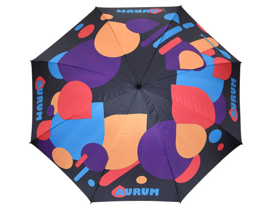 A full-colour promotional umbrella featuring a bold design with orange, purple, and blue graphics on a black background.