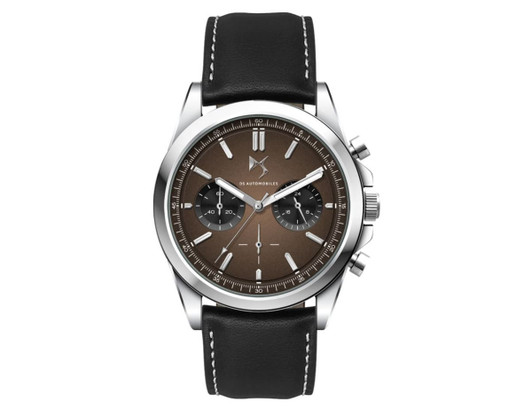 A unisex watch with a brown dial, silver case, and black leather strap featuring white stitching and a logo.