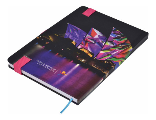 A full colour A5 notebook featuring a vibrant design with a black cover and pink elastic bands.
