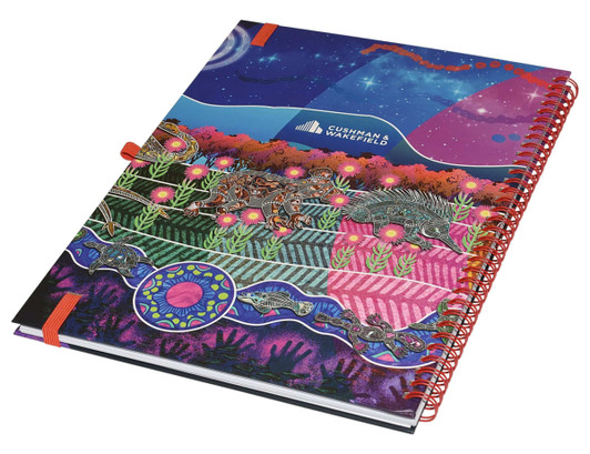 A vibrant A4 side-bound notebook with a colourful, artistic cover design and a logo. It features a red spiral binding.
