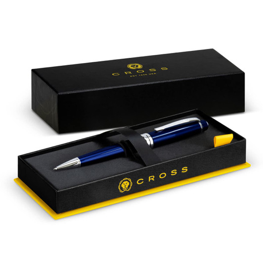 A blue ballpoint pen in an elegant black and yellow box with a logo.