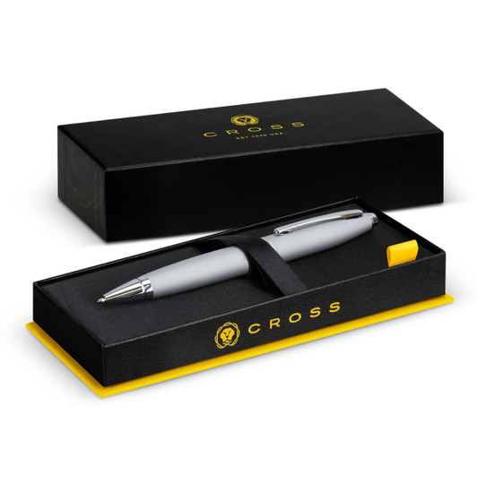 A silver ballpoint pen in a presentation box, featuring a logo and a yellow interior.