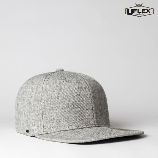 A grey kids' snapback cap with a flat brim and a branding logo on the side.