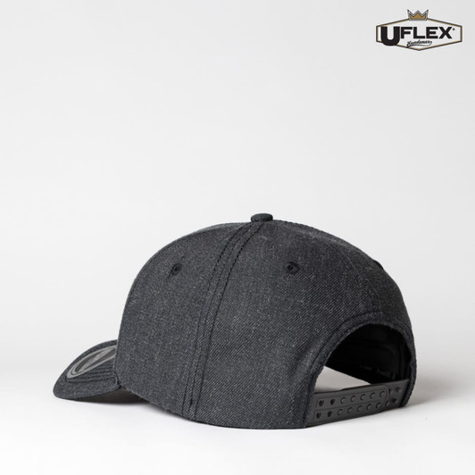 A dark grey snapback cap featuring a curved brim and an adjustable back strap, with a logo displayed on the side.