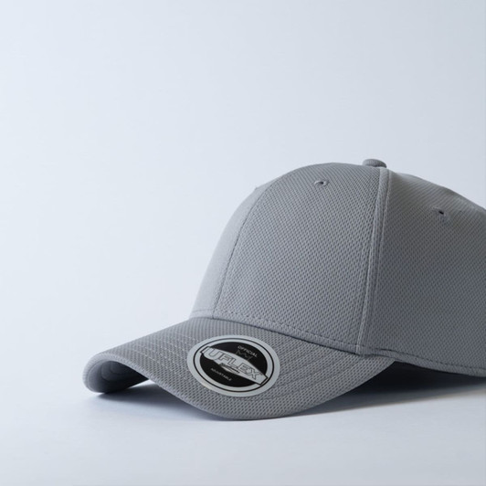 A grey Recycled Polyester Cap featuring a structured design and a logo on the side.