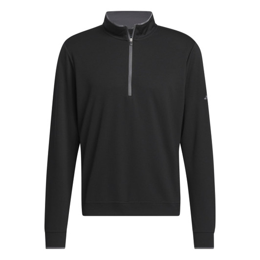 A black quarter zip pullover for men, featuring a light grey zip and a logo on the sleeve.