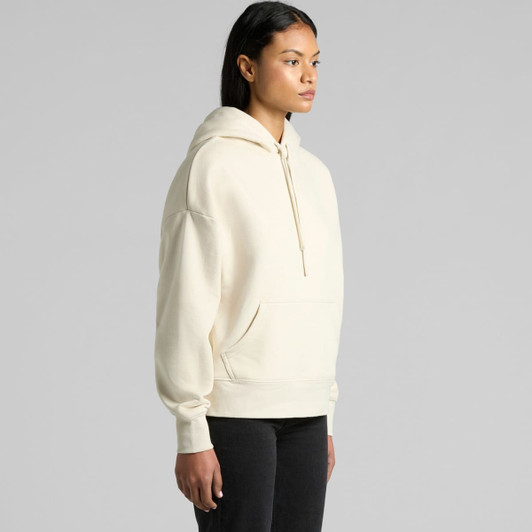 A cream-coloured hoodie featuring a front pocket and a drawstring hood. It has a subtle branding logo.