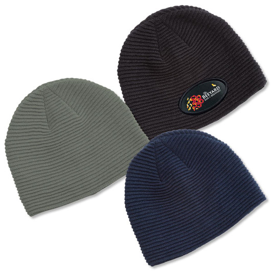 Three Ruga Knit Beanies in dark green, black, and navy, featuring a branded logo on the black beanie.