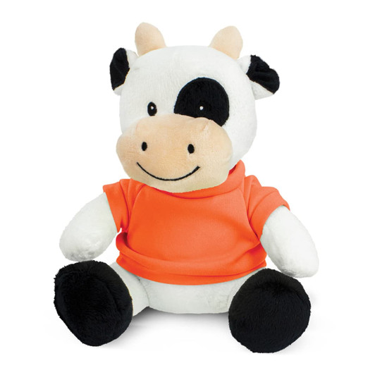 A cute cow plush toy with black and white fur, wearing an orange t-shirt and sitting upright on a white background.