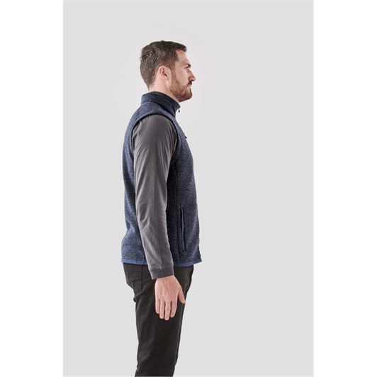A men's full zip fleece vest in navy, featuring a side view with a high collar and a logo.