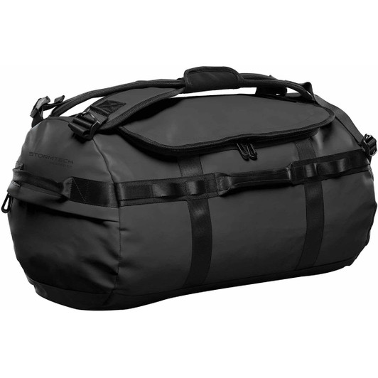 A black duffle bag with a sturdy design, featuring handles and straps, and a logo on the side.