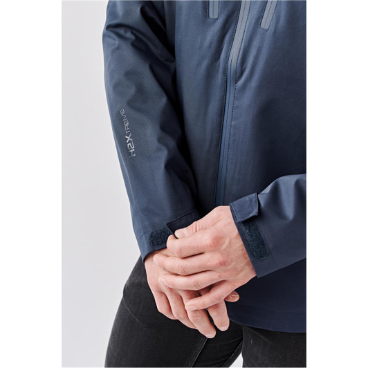 A lightweight navy rain jacket with a zip closure and adjustable cuffs. Features branding on the sleeve.