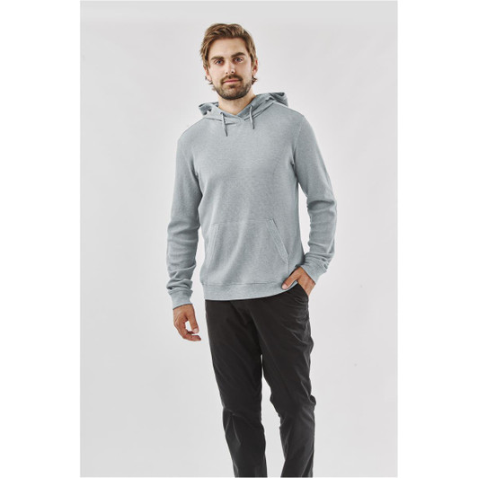 A grey pullover hoodie for men featuring a front pocket and a drawstring hood. The model is wearing it with dark pants.