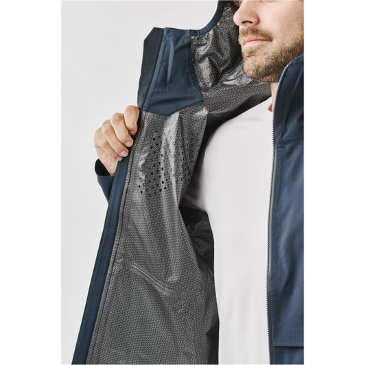 A technical rain jacket in navy, featuring a ventilated interior and a visible logo.