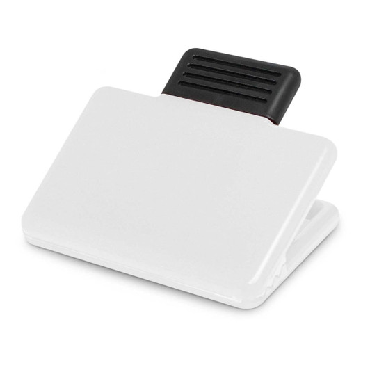 A white magnetic clip with a black gripping section. The clip is designed for holding papers or notes.