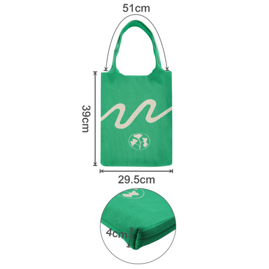 A green knitted shoulder bag with a wave design, featuring a zippered pocket at the base and dimensions provided.