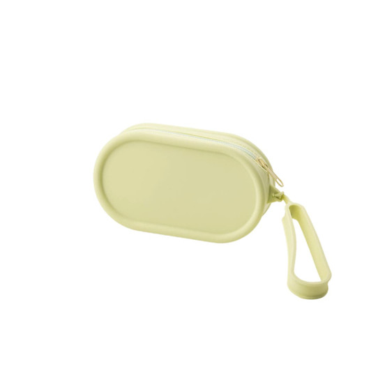 A round, pale yellow silicone storage bag with a zipper and a convenient carrying strap.