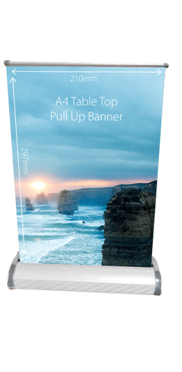A table top pull-up banner featuring a scenic coastal image with a sunset, in shades of blue and orange. It has a logo.