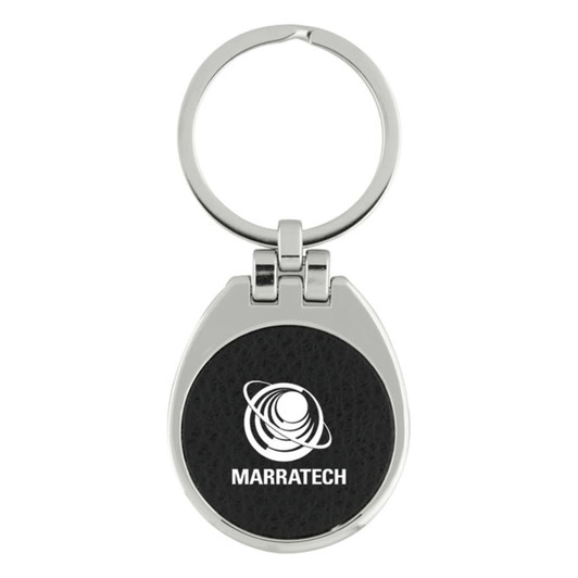 A silver keychain with a black leather-like section featuring a logo. The keychain has a circular ring for keys.