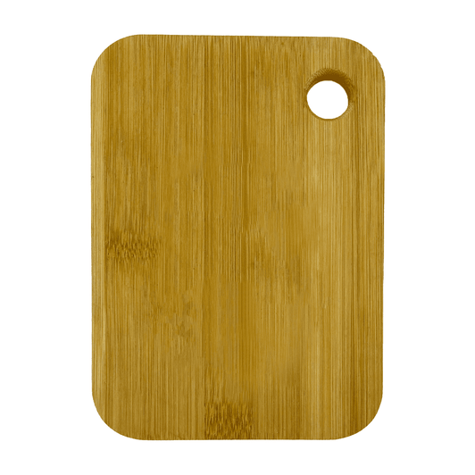 A small bamboo cutting board in a light brown hue with a rounded corner and a hanging hole.