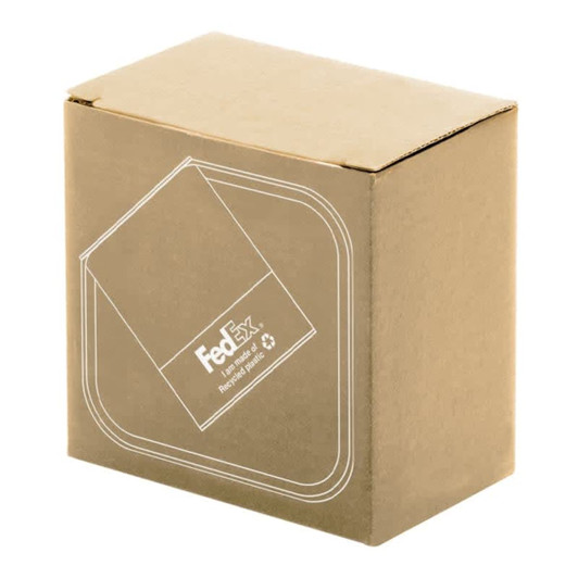 A cardboard box in a natural brown colour, featuring a logo and a recycled materials indication.