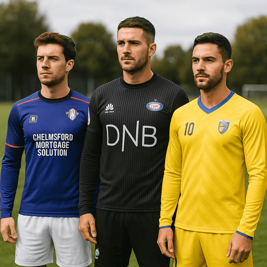 Three male soccer players in long sleeve jerseys: blue, black, and yellow, featuring various logos and designs.