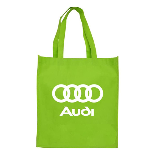 A large green shopping tote bag with long handles and a logo prominently displayed on the front.
