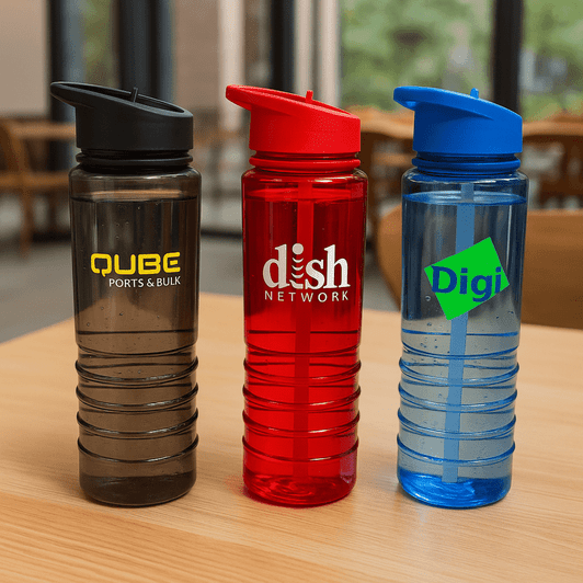 A drink bottle trio featuring black, red, and blue Tritan bottles with logos. Each has a flip-top lid and a textured grip.