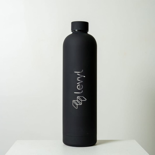 A drink bottle in matte black with a sleek design and a logo displayed on the front.