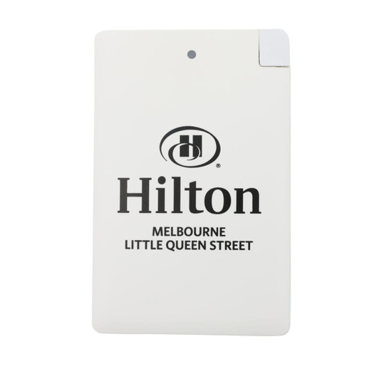 A white power bank with rounded edges and a logo in the centre. It is slim and portable in design.