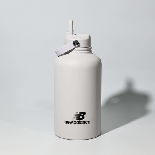 A drink bottle in matte white with a spout lid. It features a logo on the front.