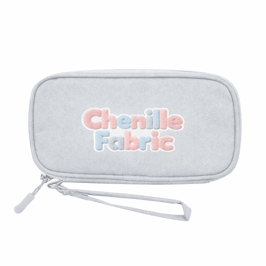 A grey carrying case made from chenille fabric, featuring colourful embroidered text.