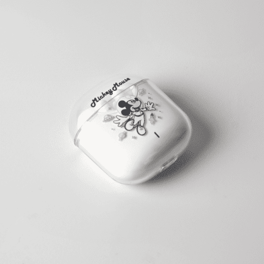 A white case for earphones featuring an illustration of Mickey Mouse and a logo.