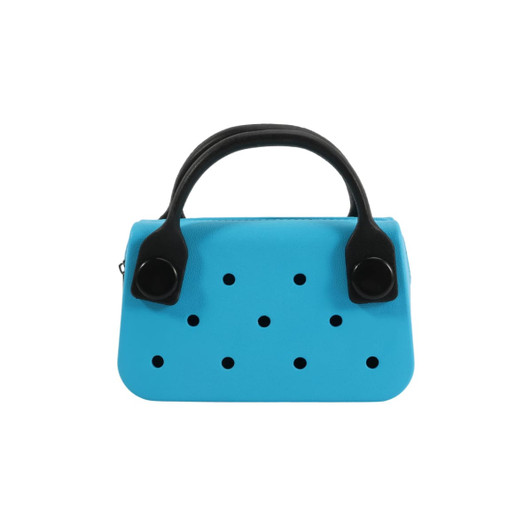 A small handbag in bright blue with black handles and holes on the front, featuring a logo.