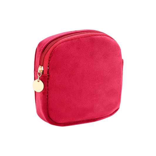 A stylish mini makeup bag in a vibrant red colour, featuring a zip closure and a small logo.