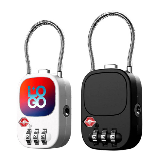 A TSA lock with a white and black body, featuring a combination dial and a logo. The lock has a silver shackle.