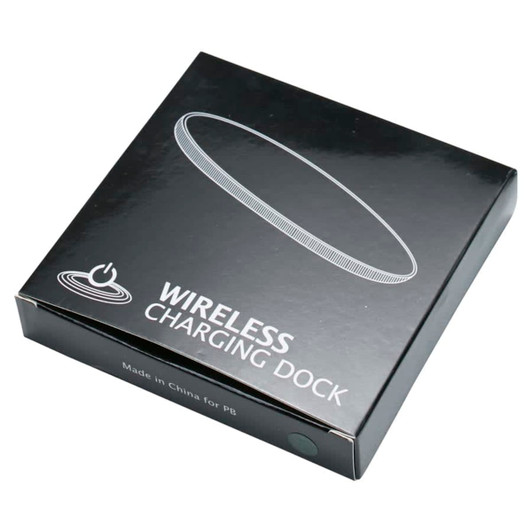 A black box containing a round wireless charging dock, featuring minimalist design and a logo.