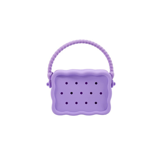 A silicone bag in lavender with a textured handle and perforations, featuring a zip closure and branding.