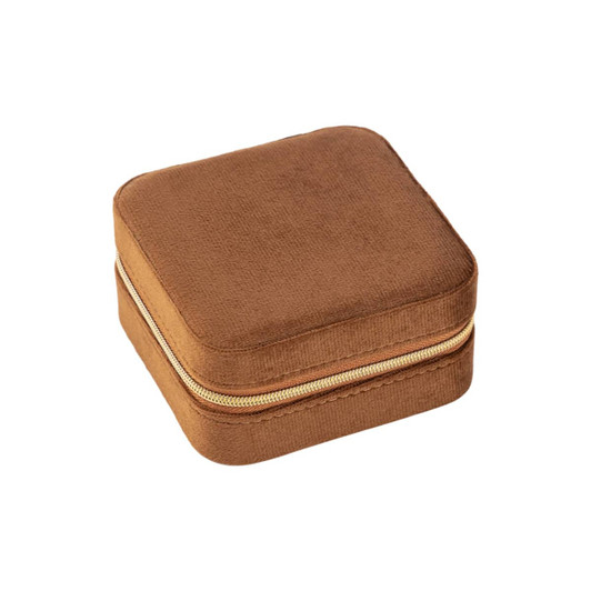 A velvet jewellery organiser in a square shape, featuring a soft brown finish and a gold zipper.