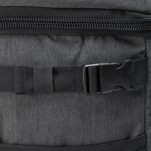 A dark grey backpack cooler featuring a zipper closure and buckle strap for secure fastening.