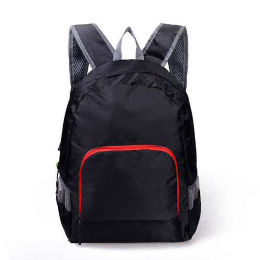 A black backpack with grey straps and a red front pocket, featuring mesh detailing and a logo.