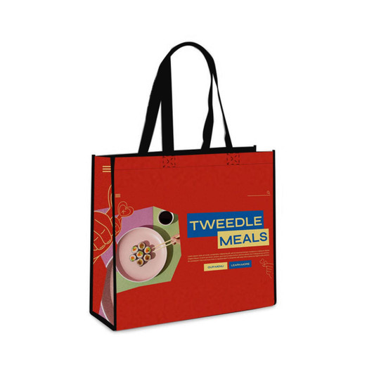 A red laminated non-woven trade show bag with black handles and a colourful design featuring a logo.