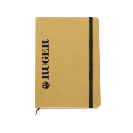 A tan notebook with a black logo and an elastic band closure. It features a textured cover and a zip pocket.