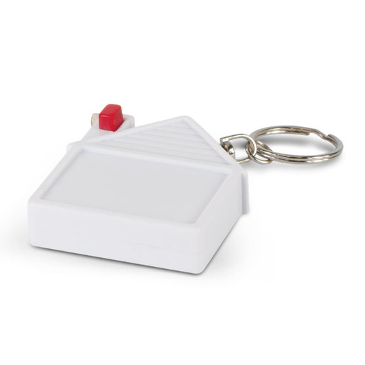 A house-shaped tape measure key ring featuring a red button and a keychain attachment.