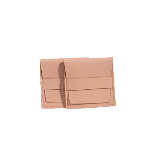 A PU leather flip jewelry pouch in a soft pink shade, featuring a sleek design with a clasp closure.