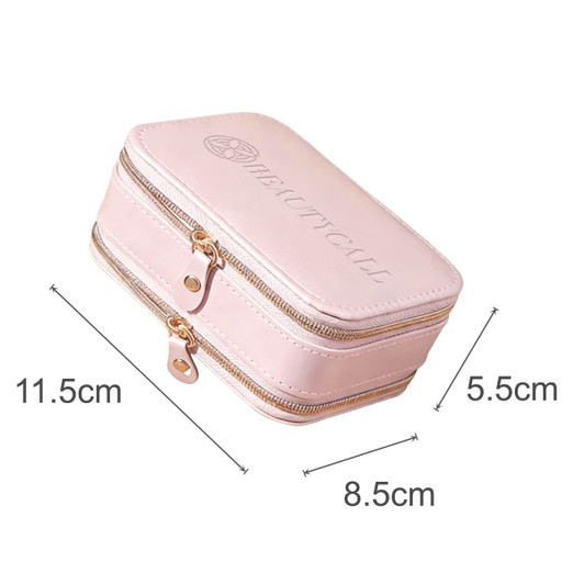 A pink PU leather jewellery case with a mirror, featuring dual zippers and a logo on the lid. Dimensions provided.