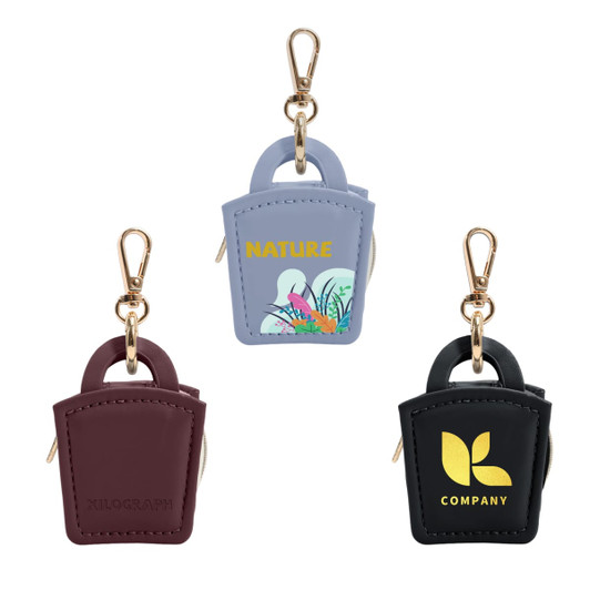 A mini PU leather jewellery box in blue, maroon, and black with gold hardware and a branding logo.